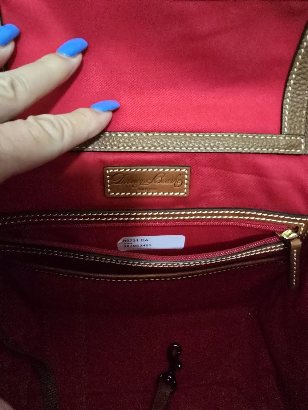 Dooney & Bourke used hand