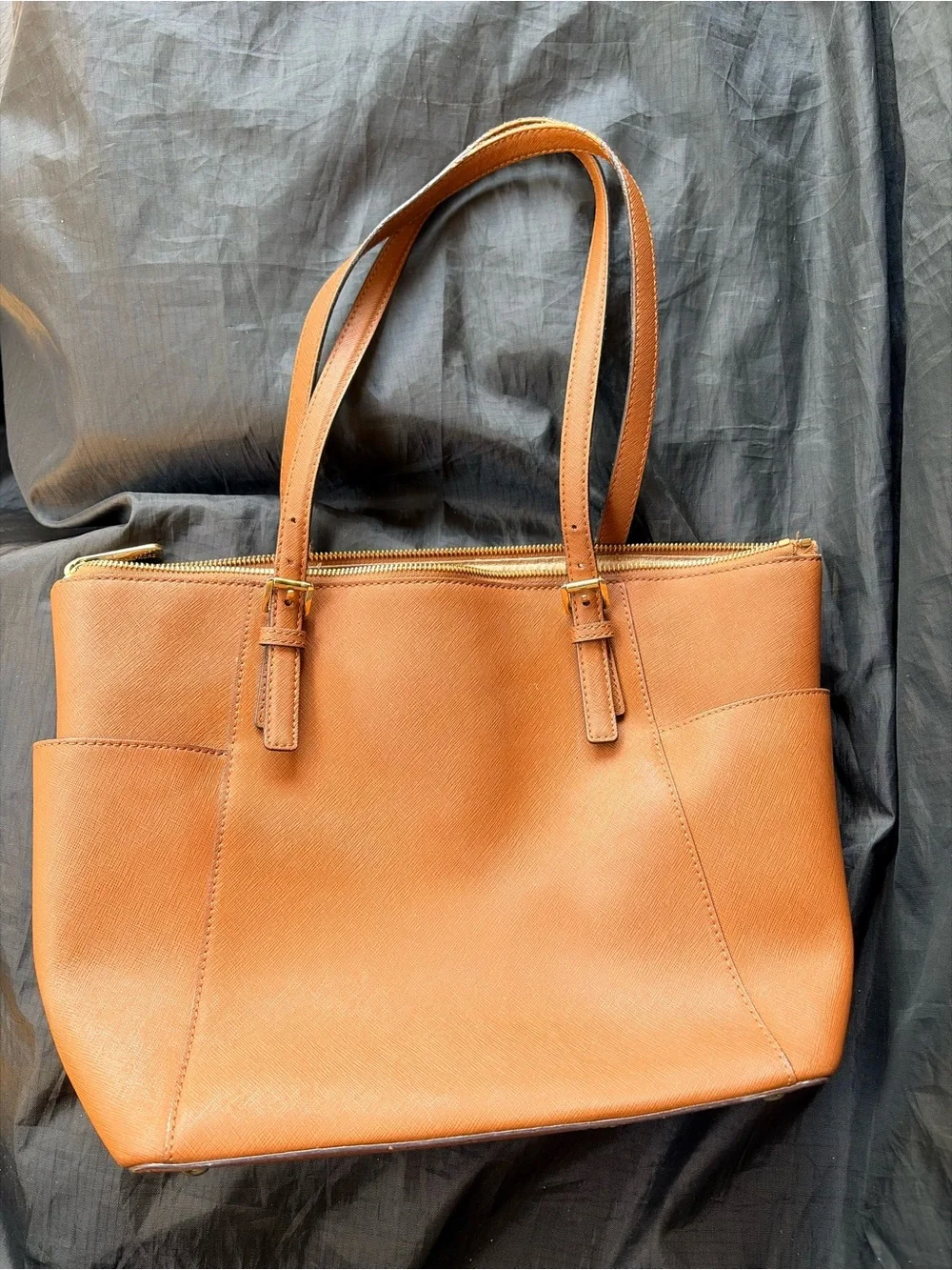 Michael Kors leather secures