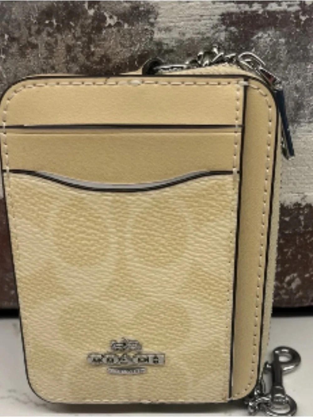 Coach Zip Card Case In Signature Canvas in the color Hay
