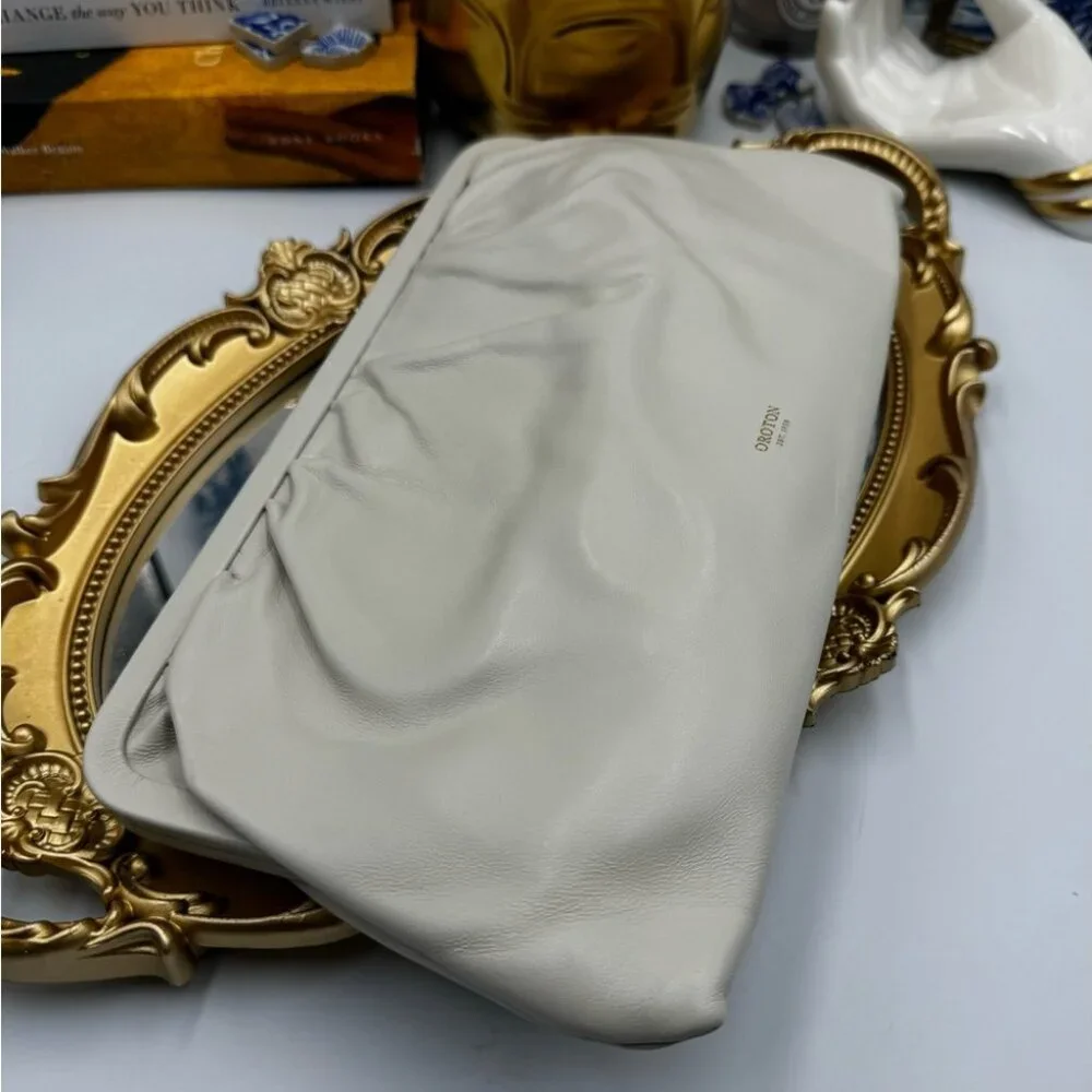Oroton just embossed