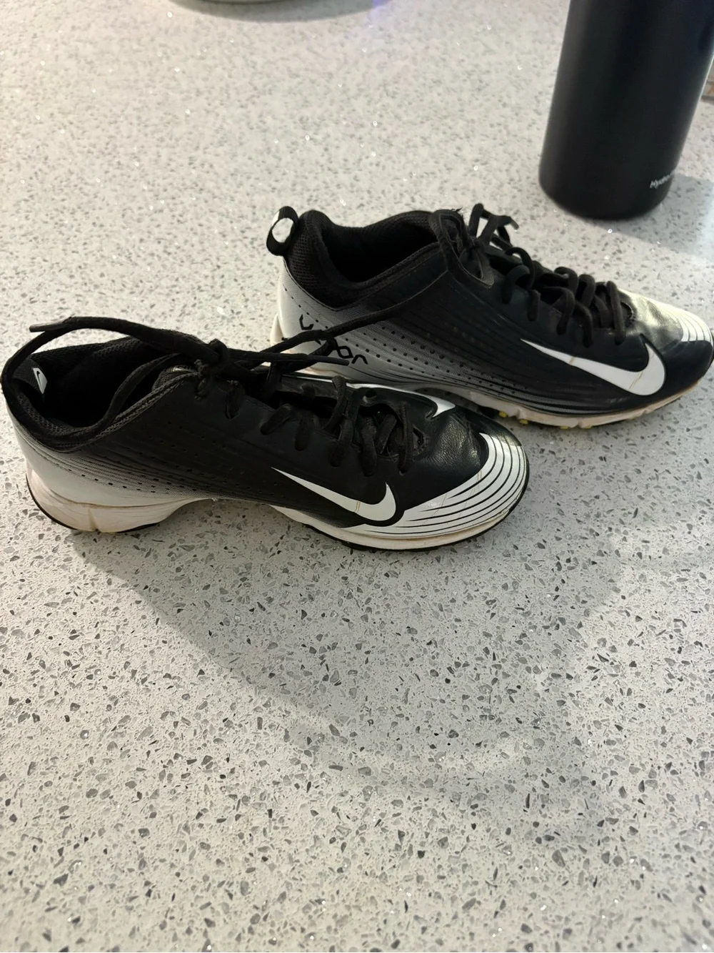 Nike Black and White Soccer Cleats with Swoosh