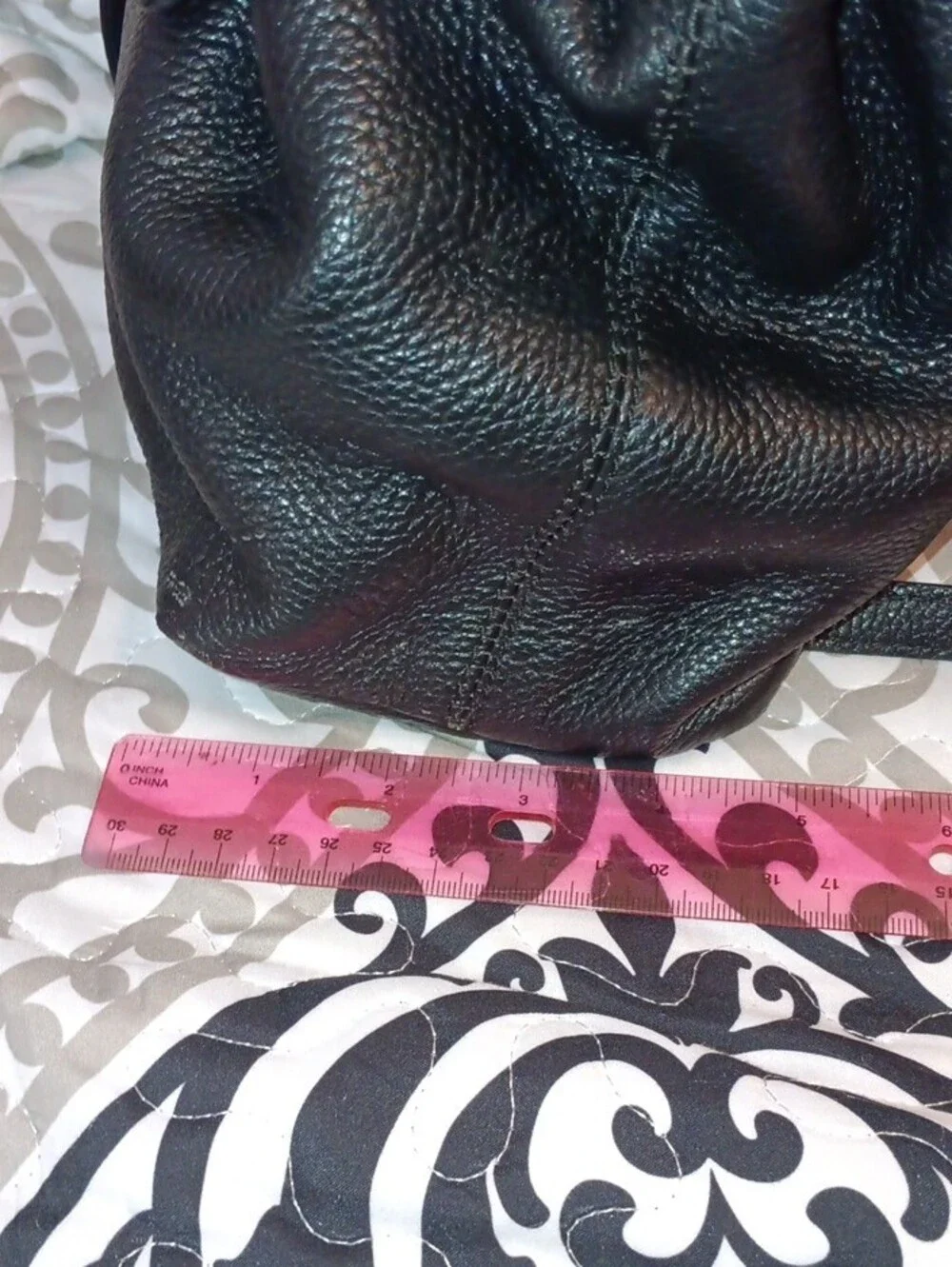 kate spade Black Pebbled Leather Drawstring Backpack