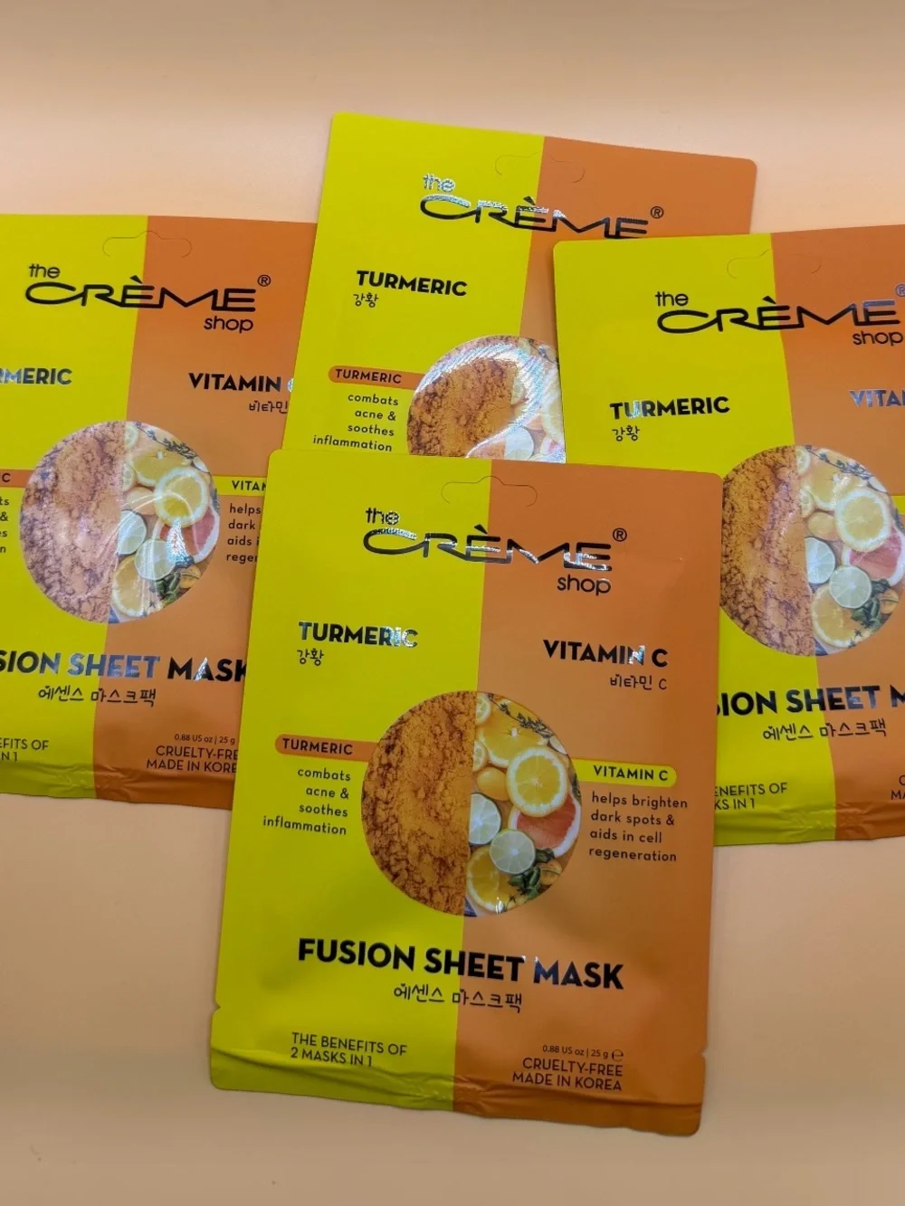 the CRÈME shop Turmeric + Vitamin C Fusion Sheet Mask - Yellow & Orange Set of 4