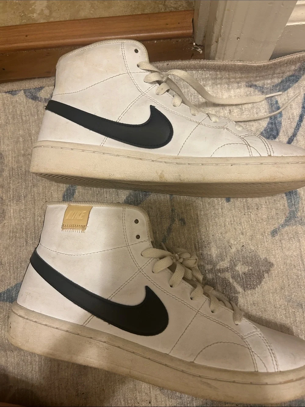 Nike Men’s White High-Top Sneakers with Black Swoosh size 8.5