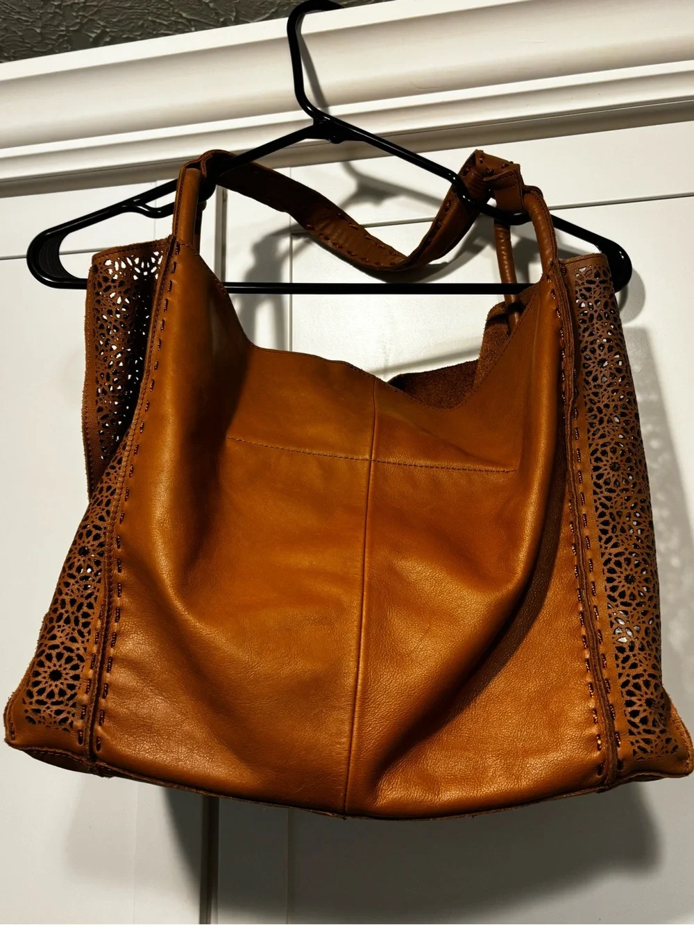 The Sak Laser-Cut Leather Hobo in Cognac