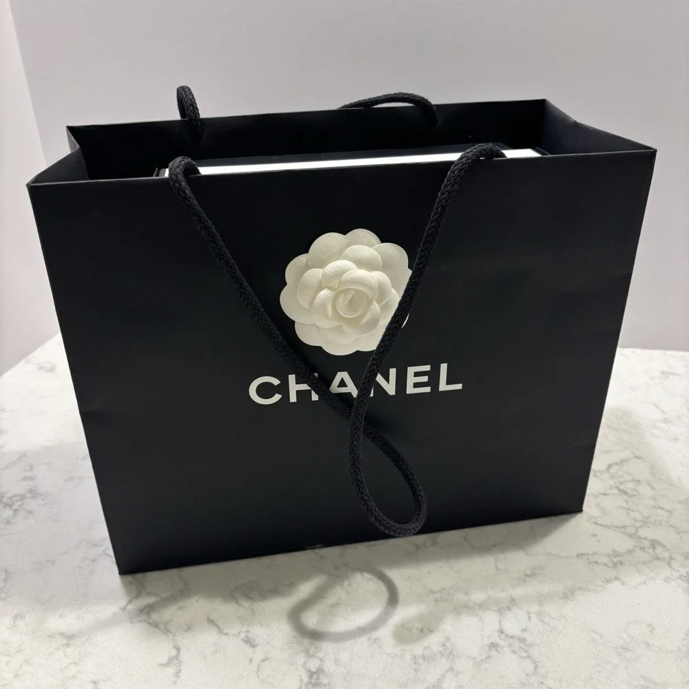CHANEL black leather
