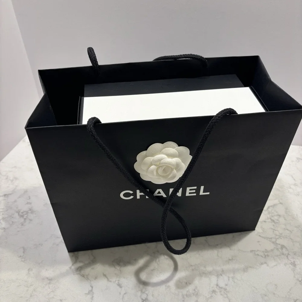 CHANEL black leather