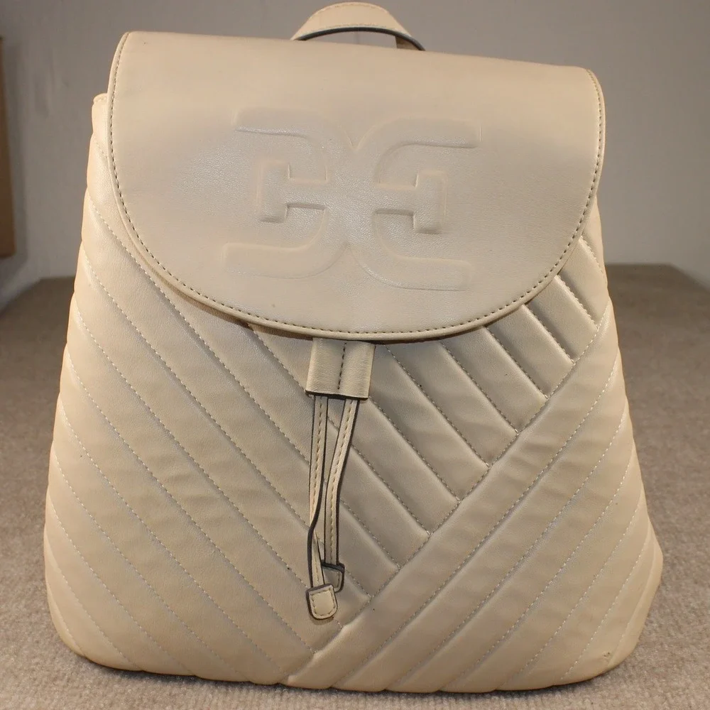 Sam Edelman Beige Quilted Faux Leather Drawstring Backpack Logo Flap Bag