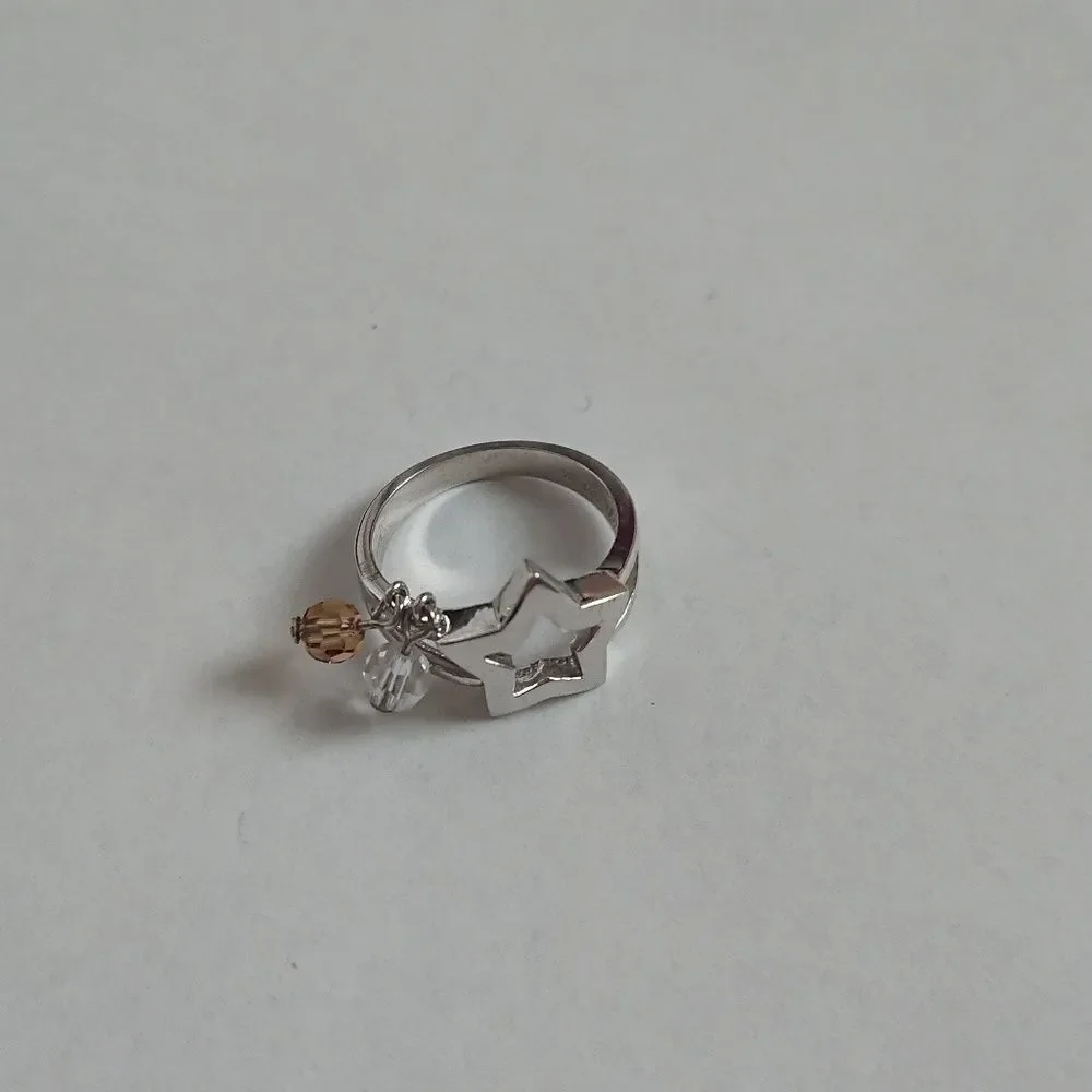 Silver star and decorative pendants ring
