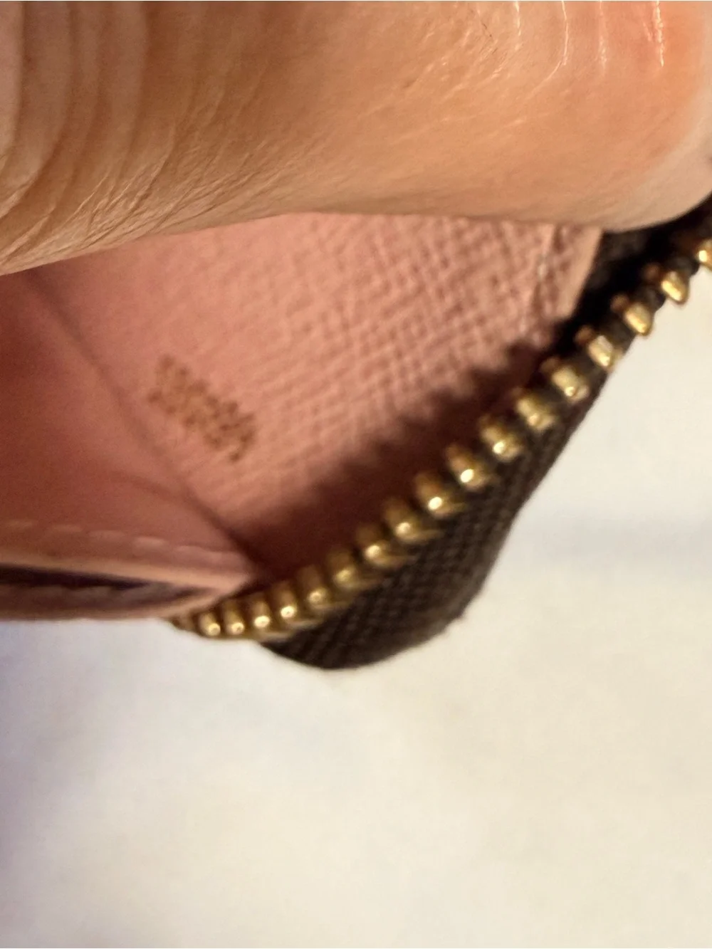 Louis Vuitton hardware zip slim
