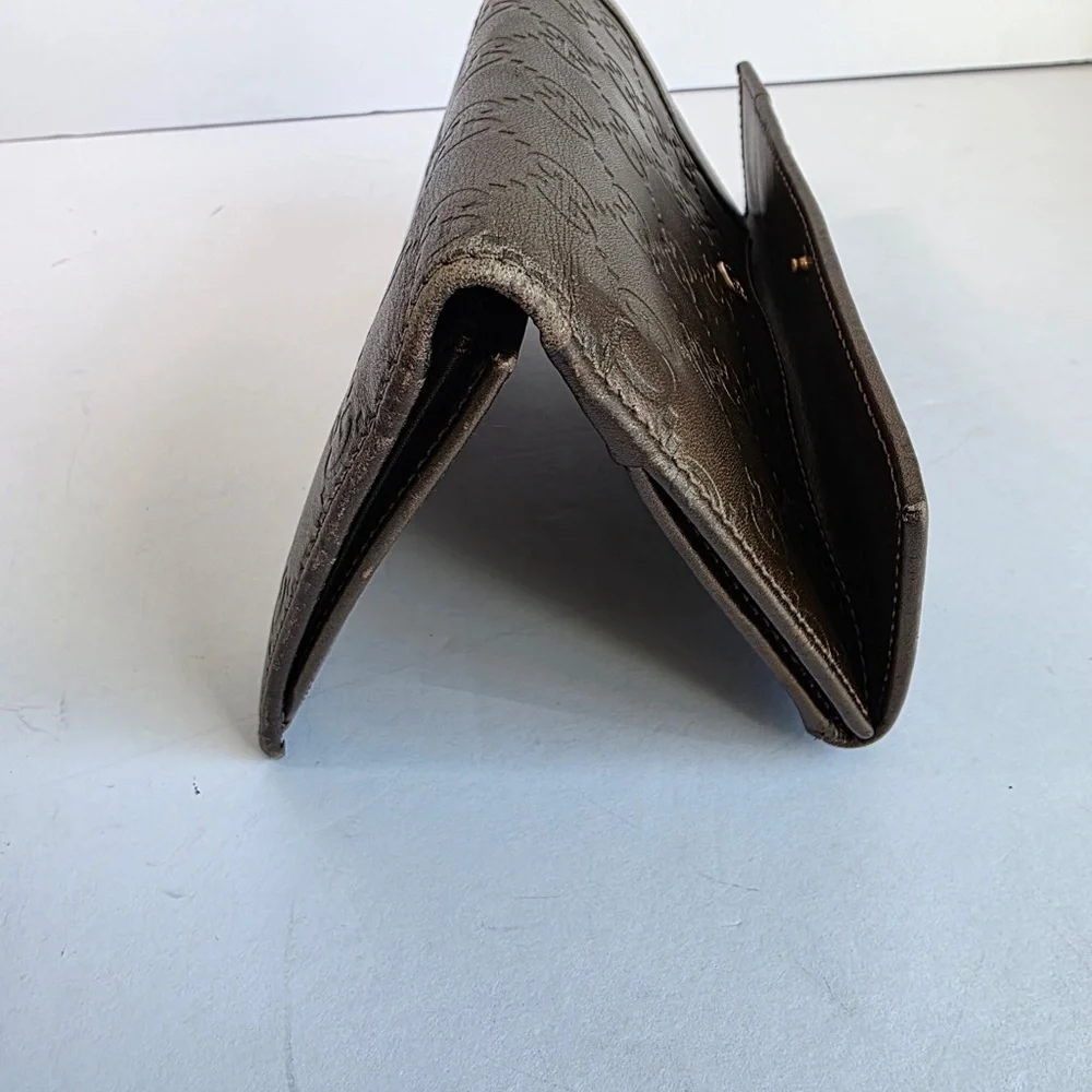 Gucci Embossed Brown Leather Wallet