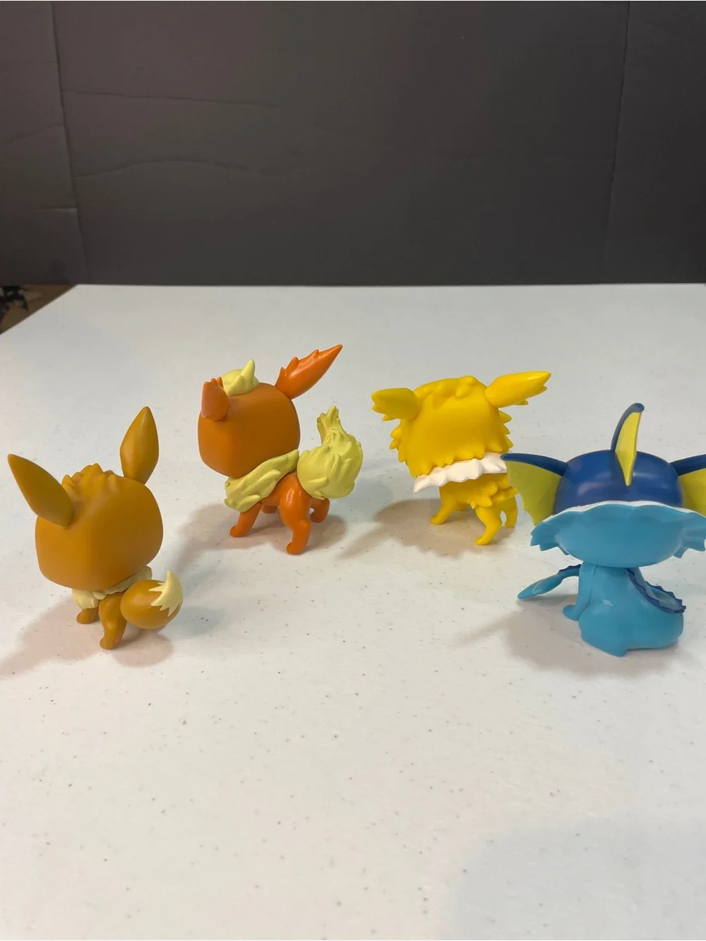 Eevee Evolution Funko-style Vinyl Figure Set (Eevee, Jolteon, Flareon, Vaporeon)