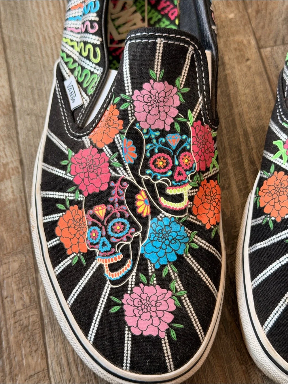 Vans Black Slip-On Sneakers with Neon Floral Sugar Skull Print-glow in dark