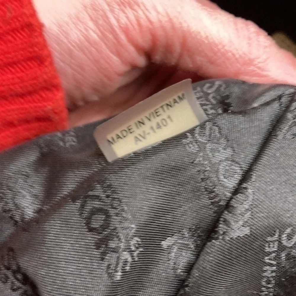 Michael Kors light edges darkened