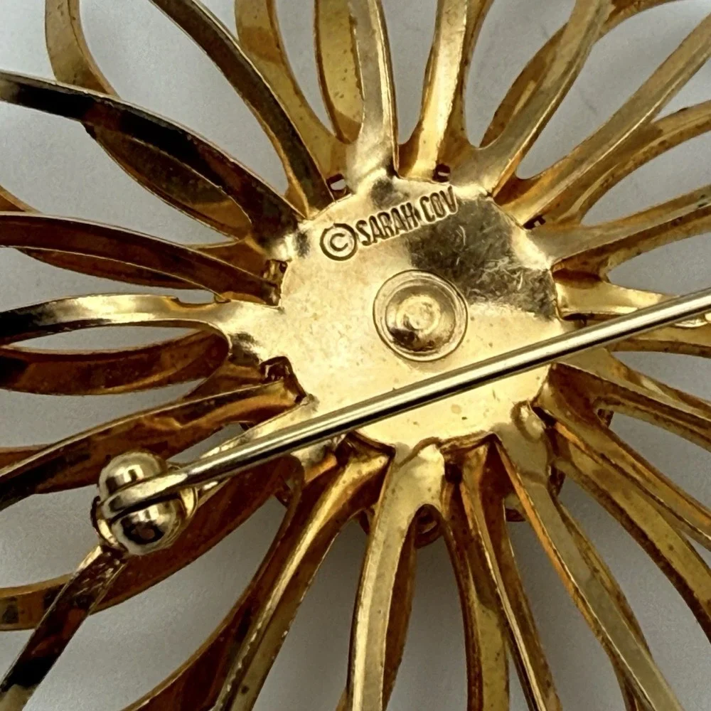 Vintage Sarah Coventry Brooch Flower Gold Tone Red Rhinestone Starburst Pin