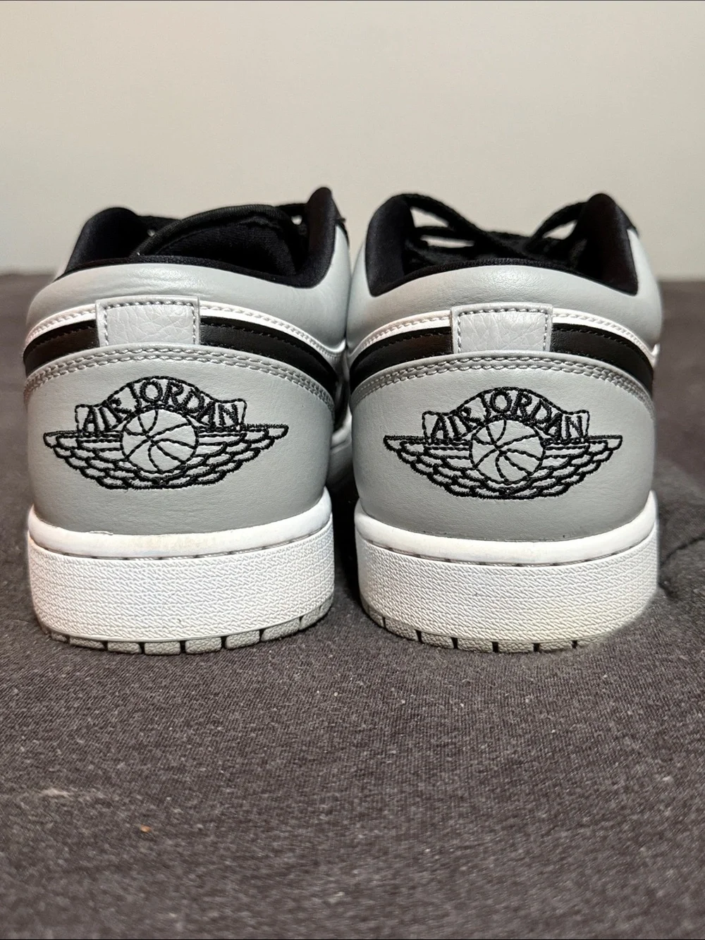 Jordan 1 Low Black, White, and Light Gray