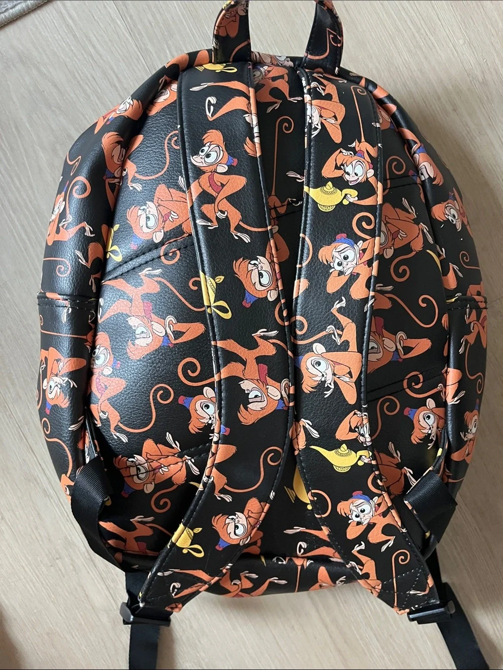 Disney Black Backpack with Orange and Yellow  