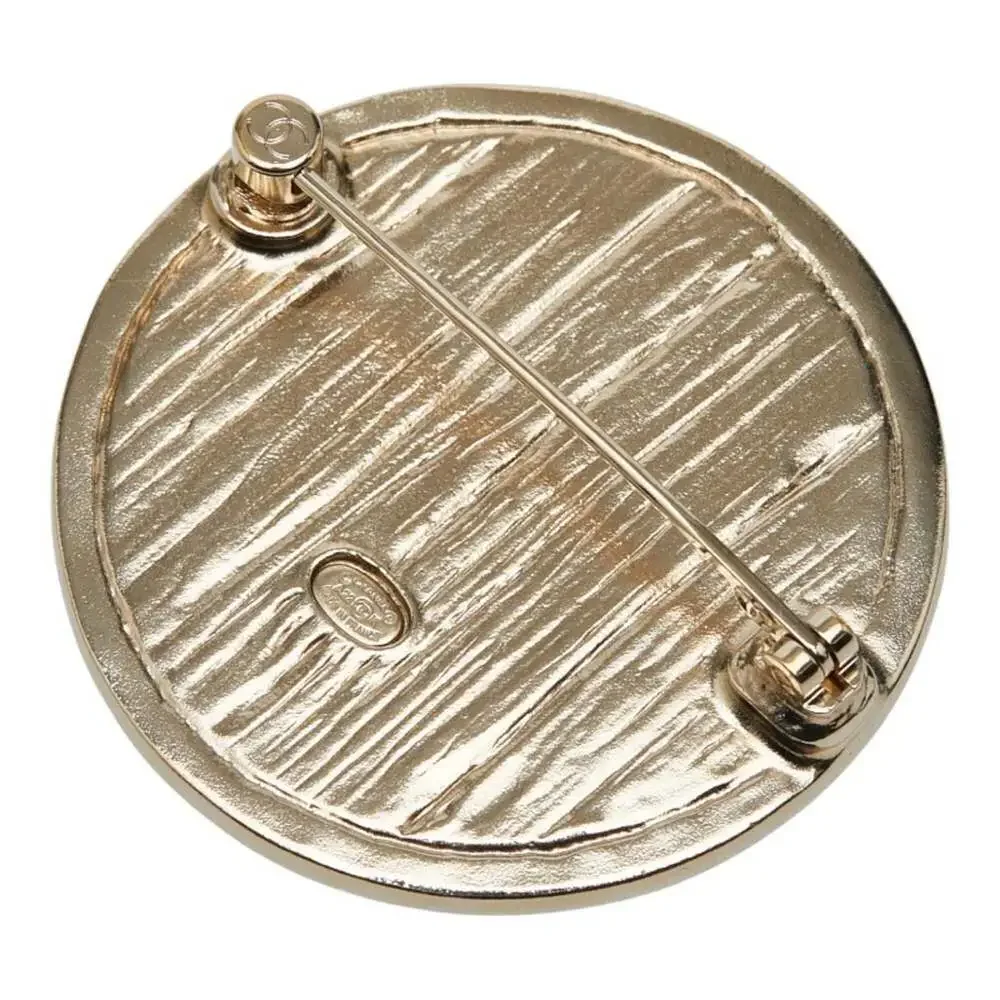 CHANEL Gold Logo Brooch