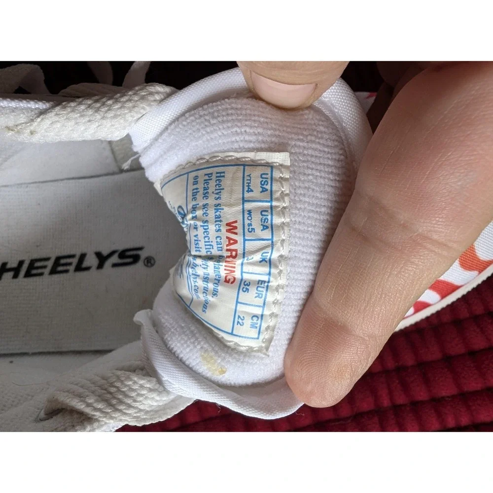Heelys width worn shoe