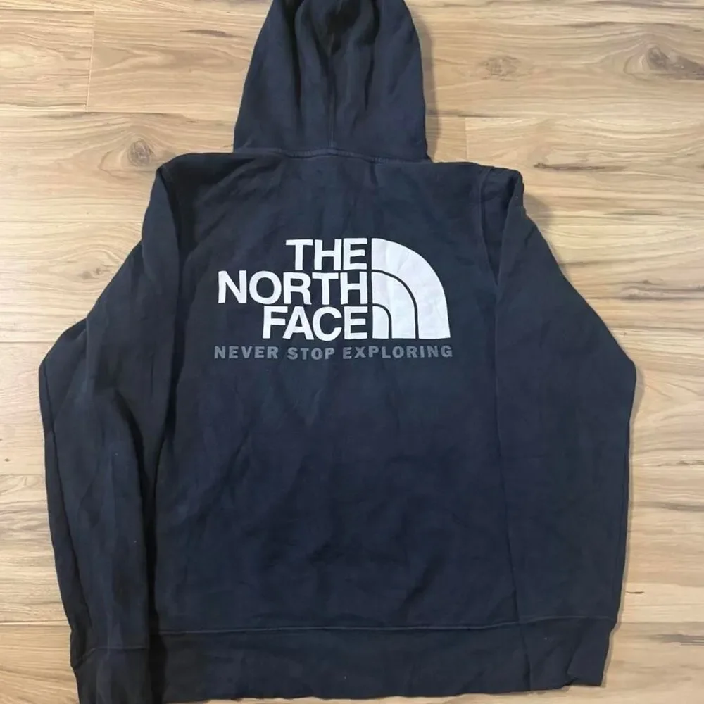 The North Face black hoodie white logo 'NEVER STOP EXPLORING' SIze Small baggy