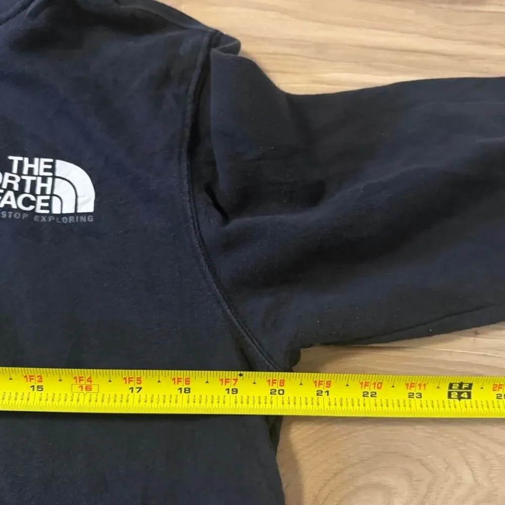 The North Face black hoodie white logo 'NEVER STOP EXPLORING' SIze Small baggy