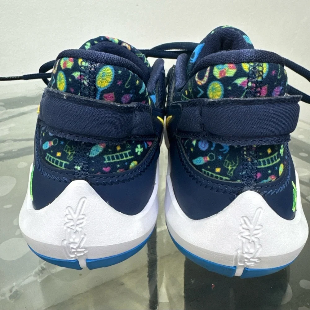 Nike Kids Navy Sneakers with Pink and Yellow Accents