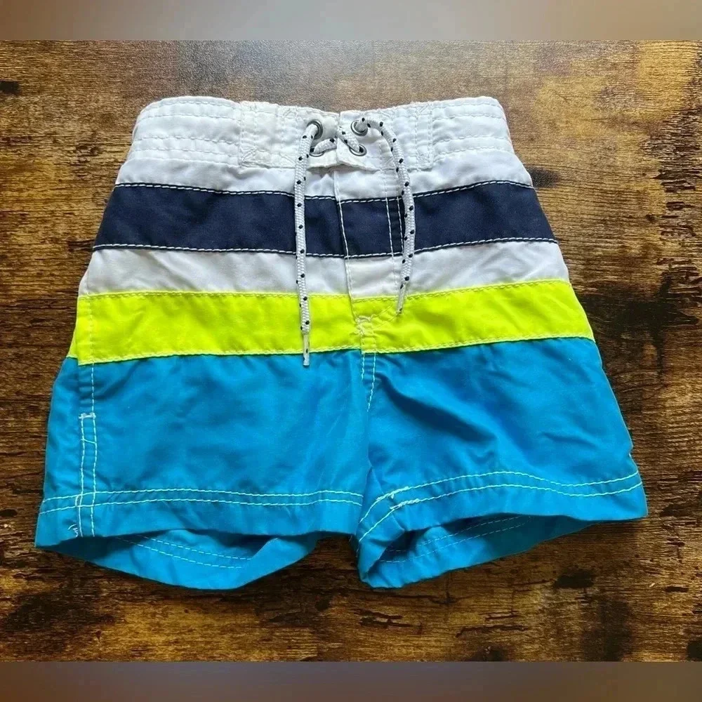 SET: Baby boy, Carter’s swim trunks + jumping beans. Size: 12M​