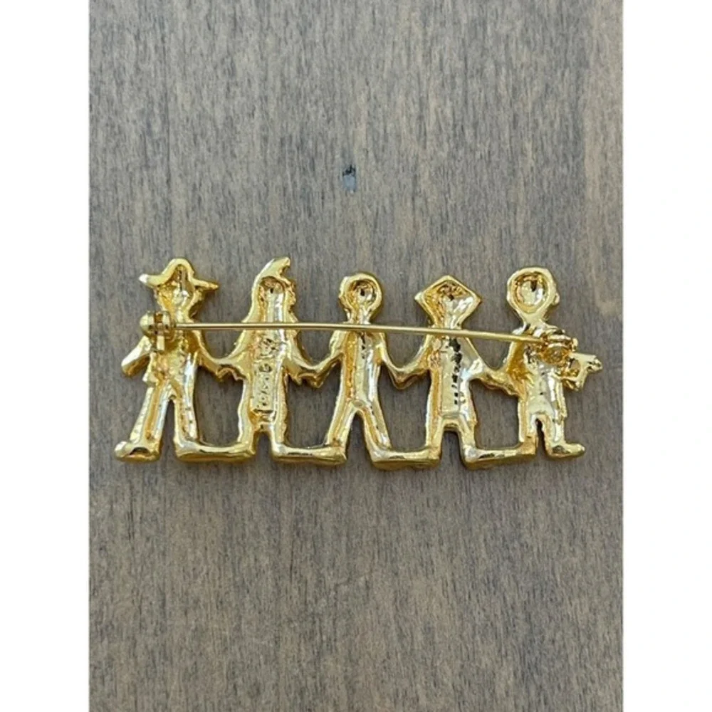 Ajc this brooch