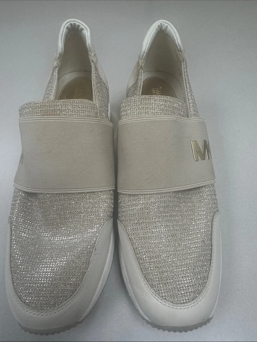 Michael Kors across sleek mk