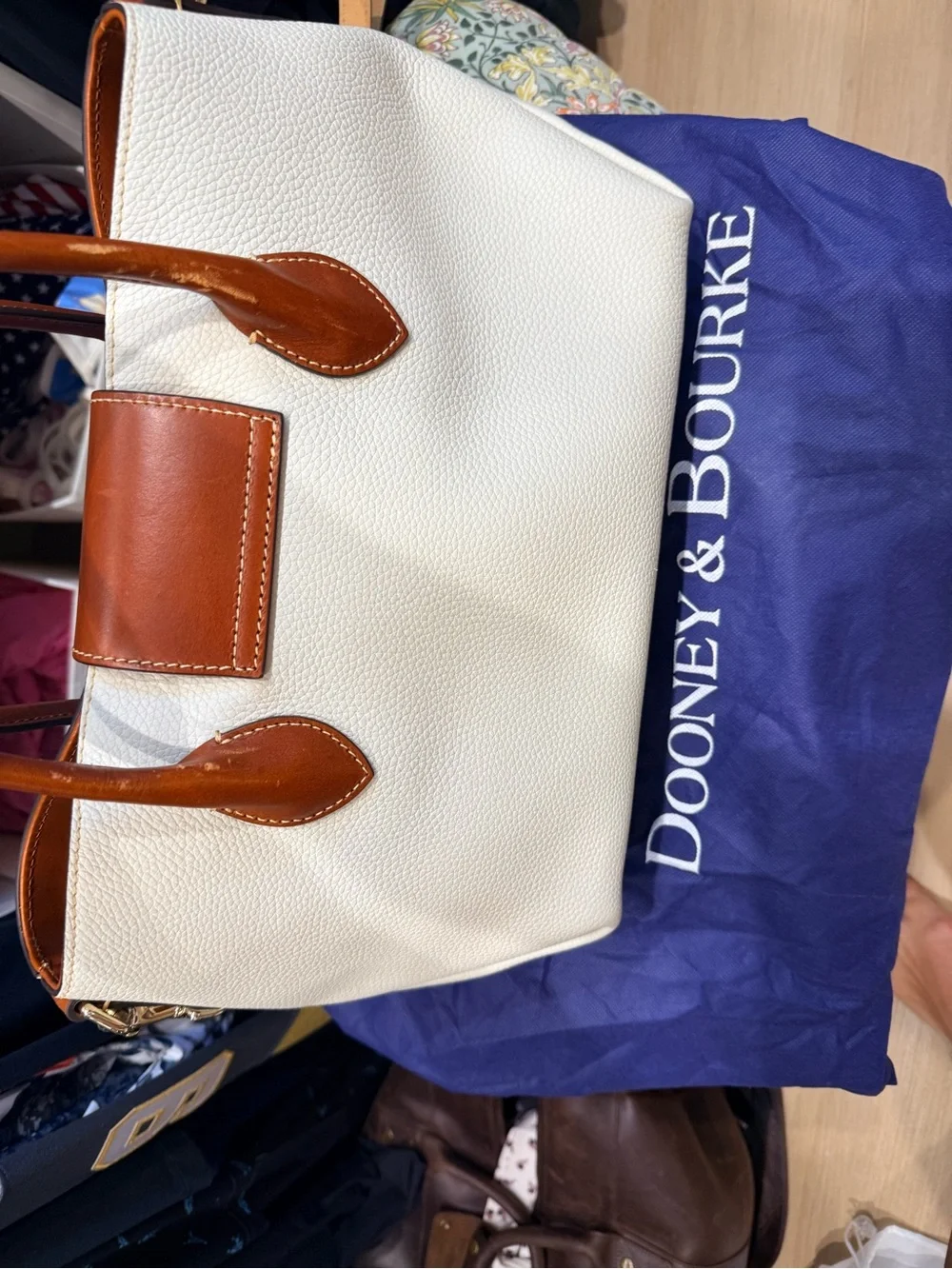 Dooney & Bourke turn brown