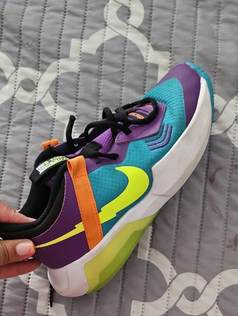 Nike Kids Teal & Purple Sneakers with Neon Yellow Swoosh and Orange Accent