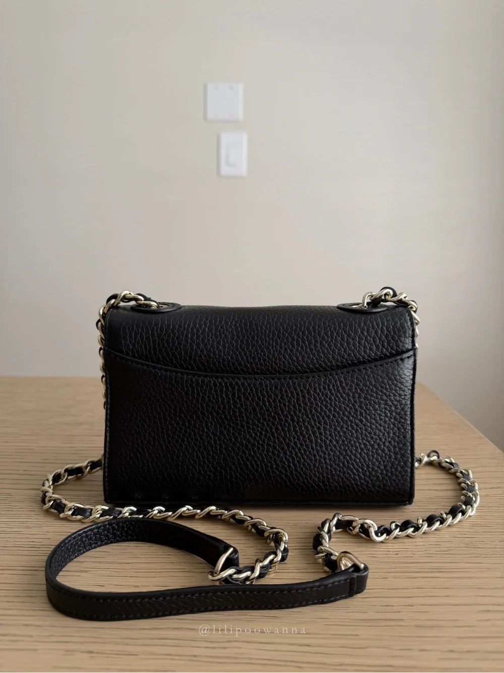 Tory Burch description corner that