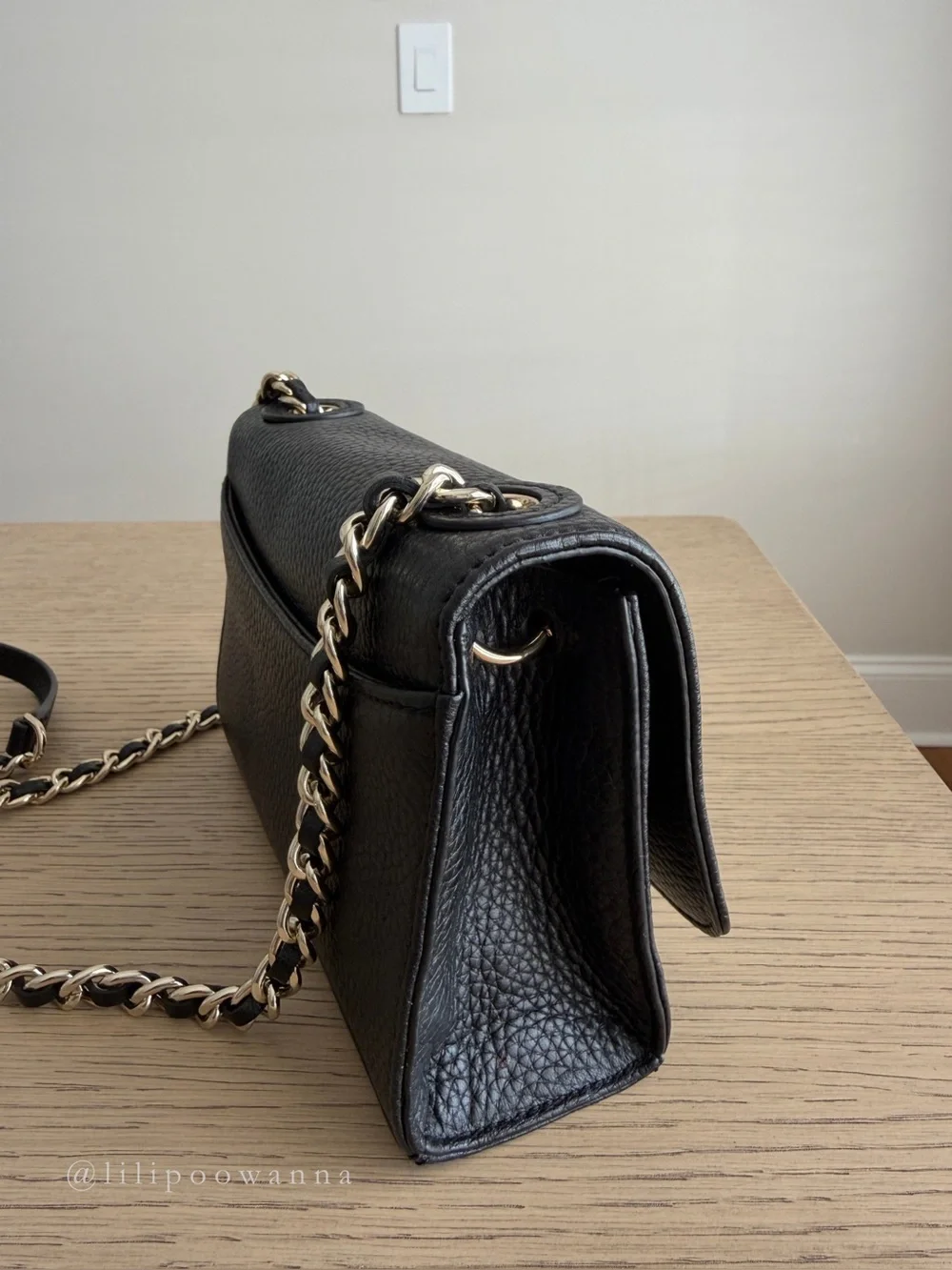 Tory Burch lifts older description