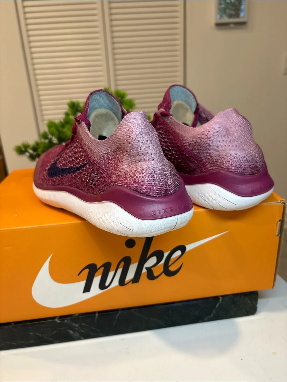 Nike burgundy accent