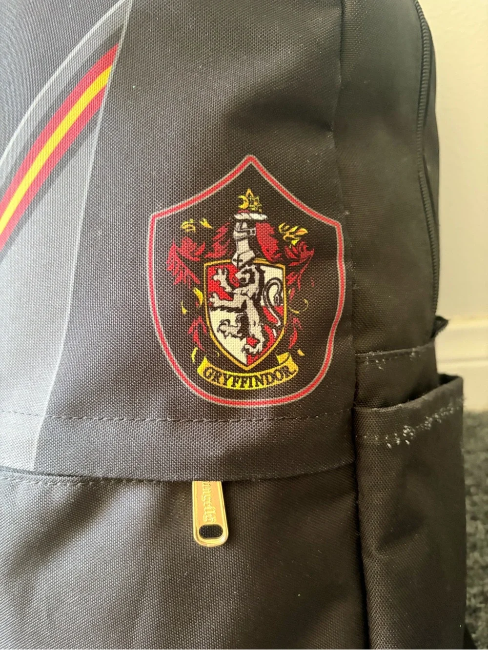 Loungefly Black Canvas Backpack with Red and Gold Accents