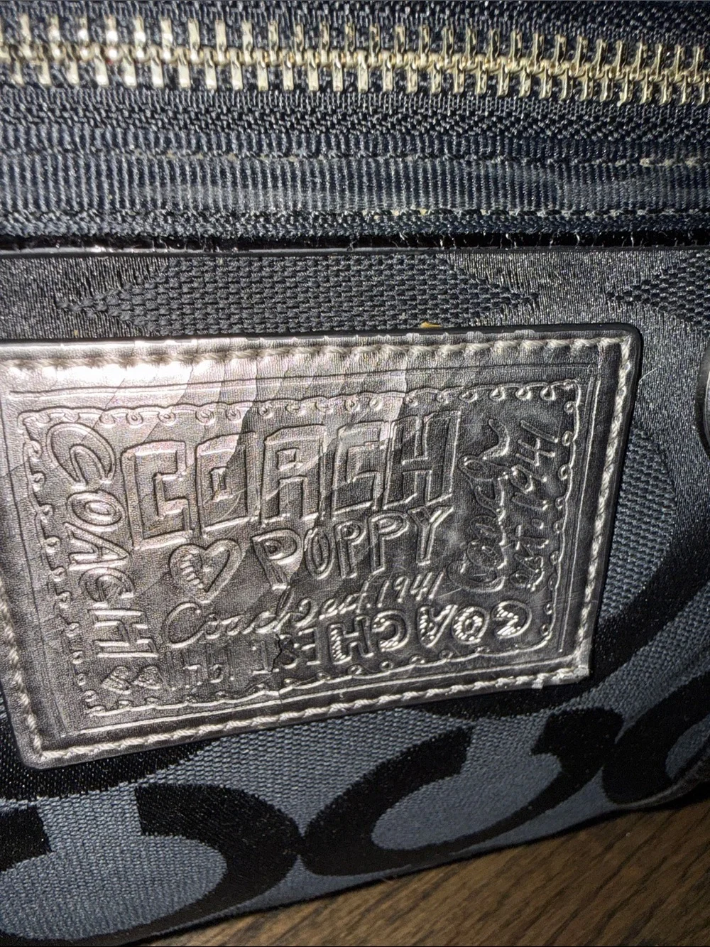 Coach tote featuring
