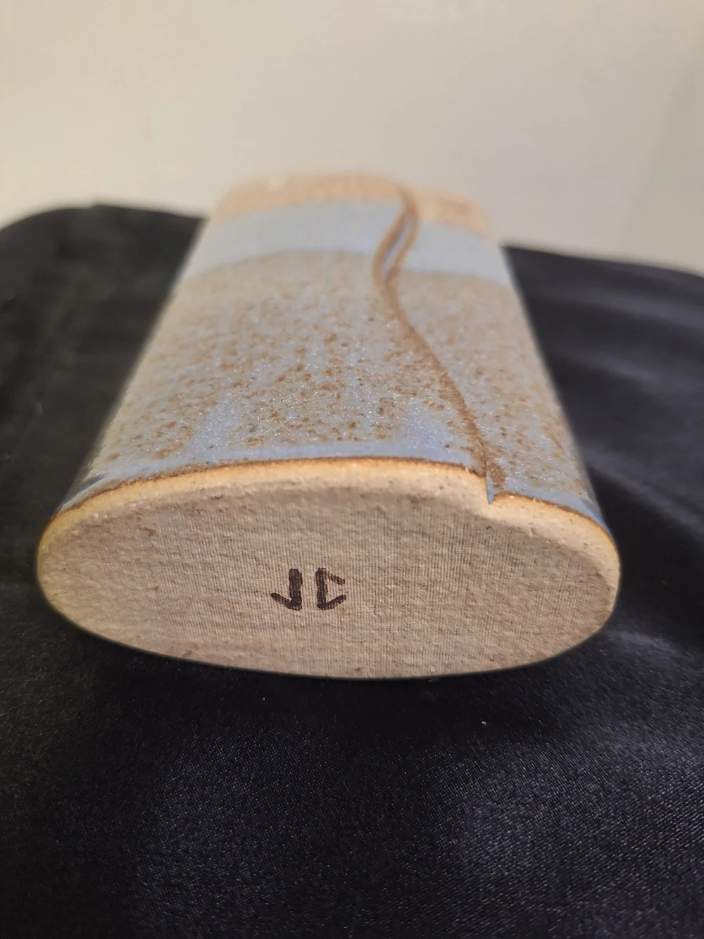 signed JC textured ceramic