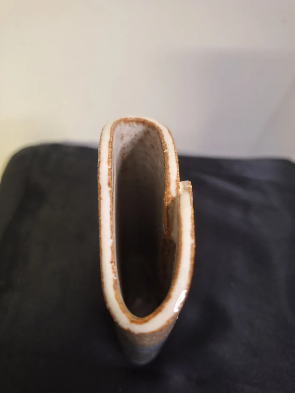signed JC textured ceramic