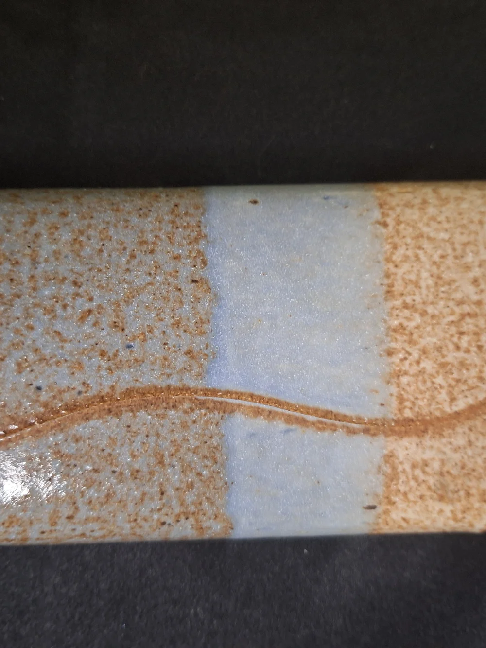 signed JC textured ceramic
