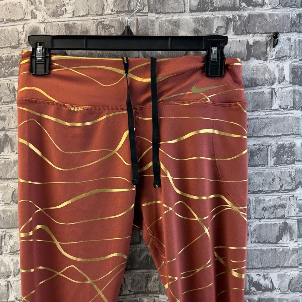 Nike running Copper and Gold Patterned Leggings‎