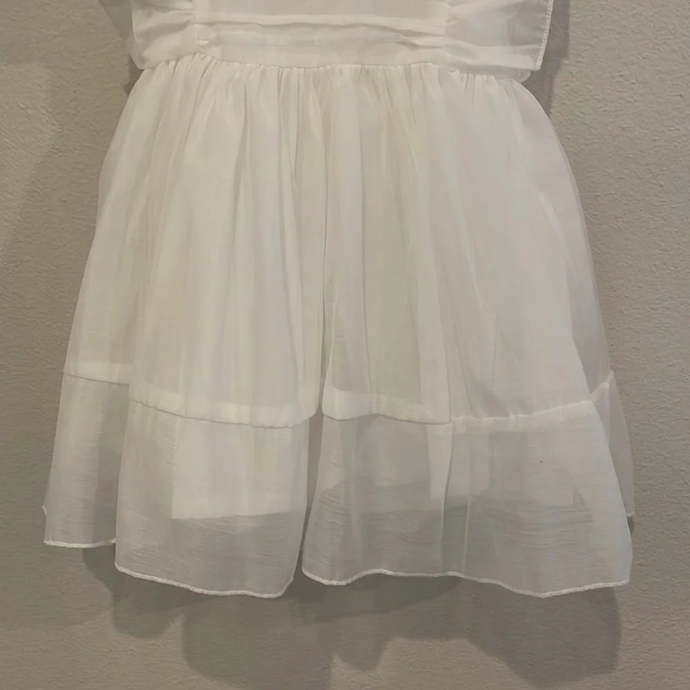 Trish Scully Child elegant white