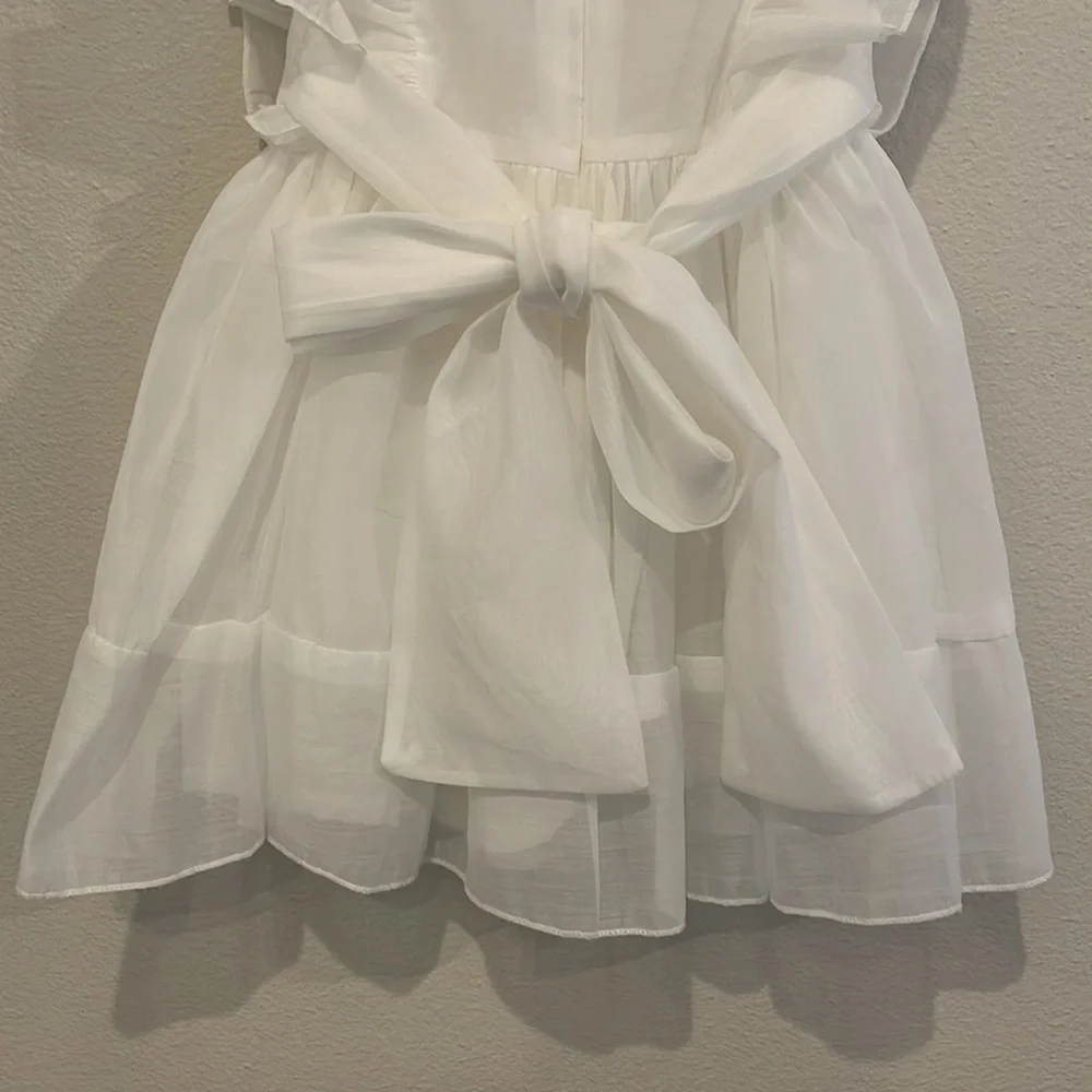 Trish Scully Child elegant white