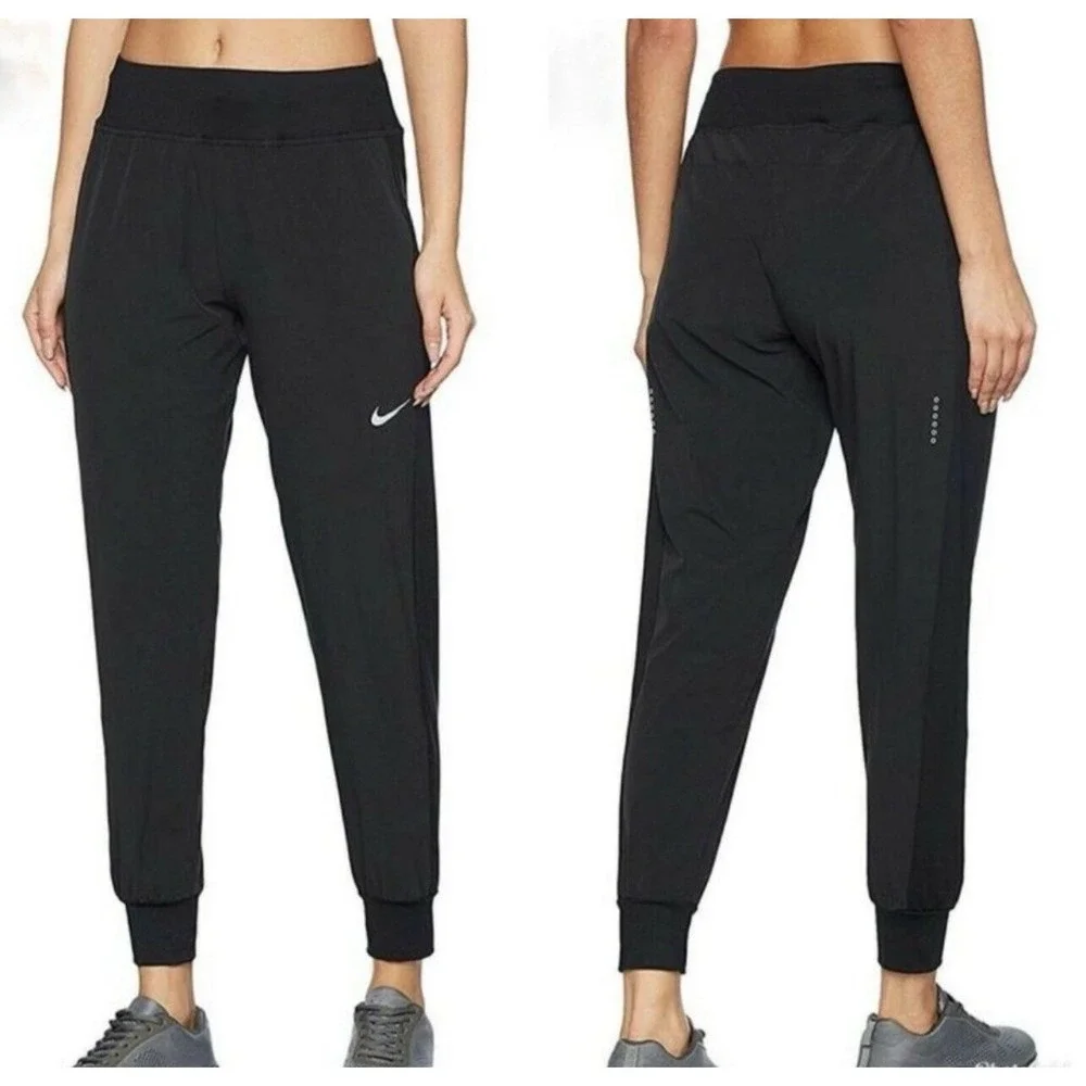 Nike Flex Essential Women's MEDIUM Running Pants Black Jogger Tapered AQ9715-010