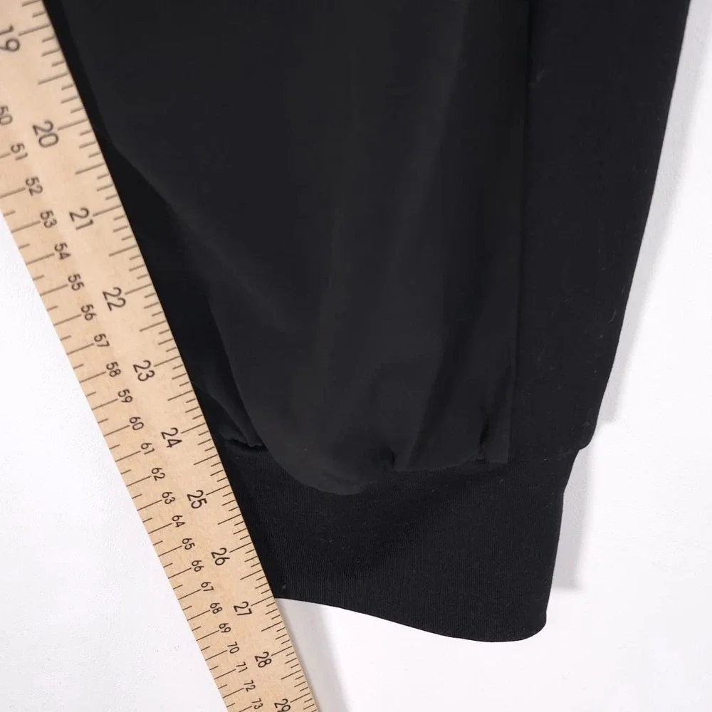 Nike Flex Essential Women's MEDIUM Running Pants Black Jogger Tapered AQ9715-010