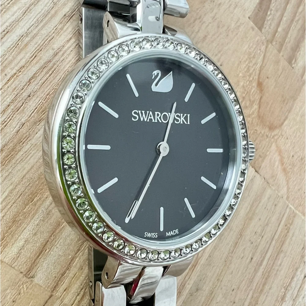Swarovski ladies stainless steel charcoal gray dial dress watch NEW BATTERY