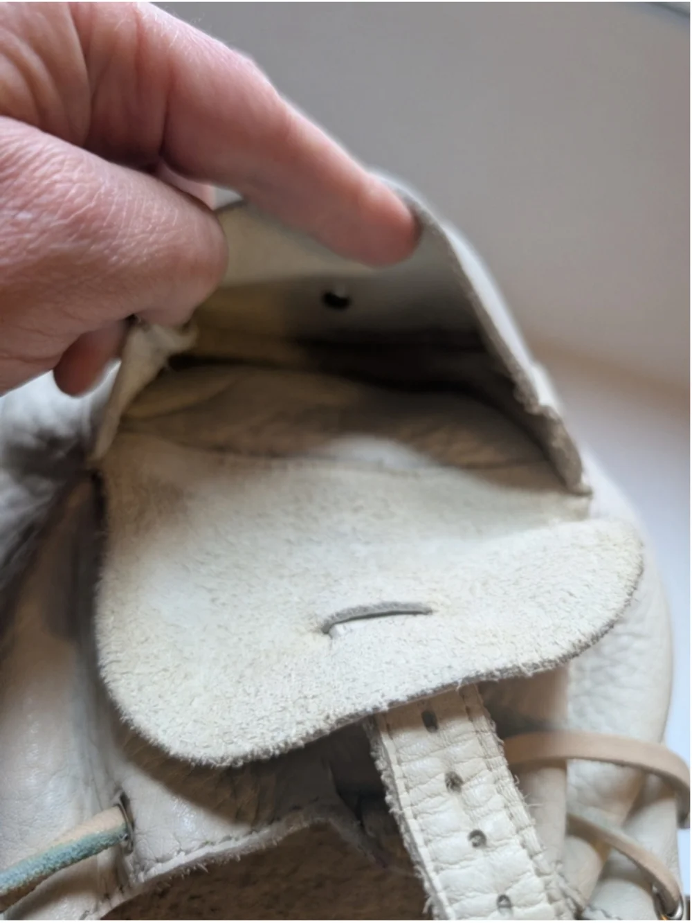 Roots leather mini
