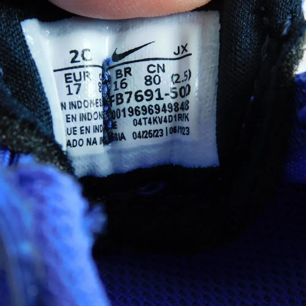 Nike revolution baby