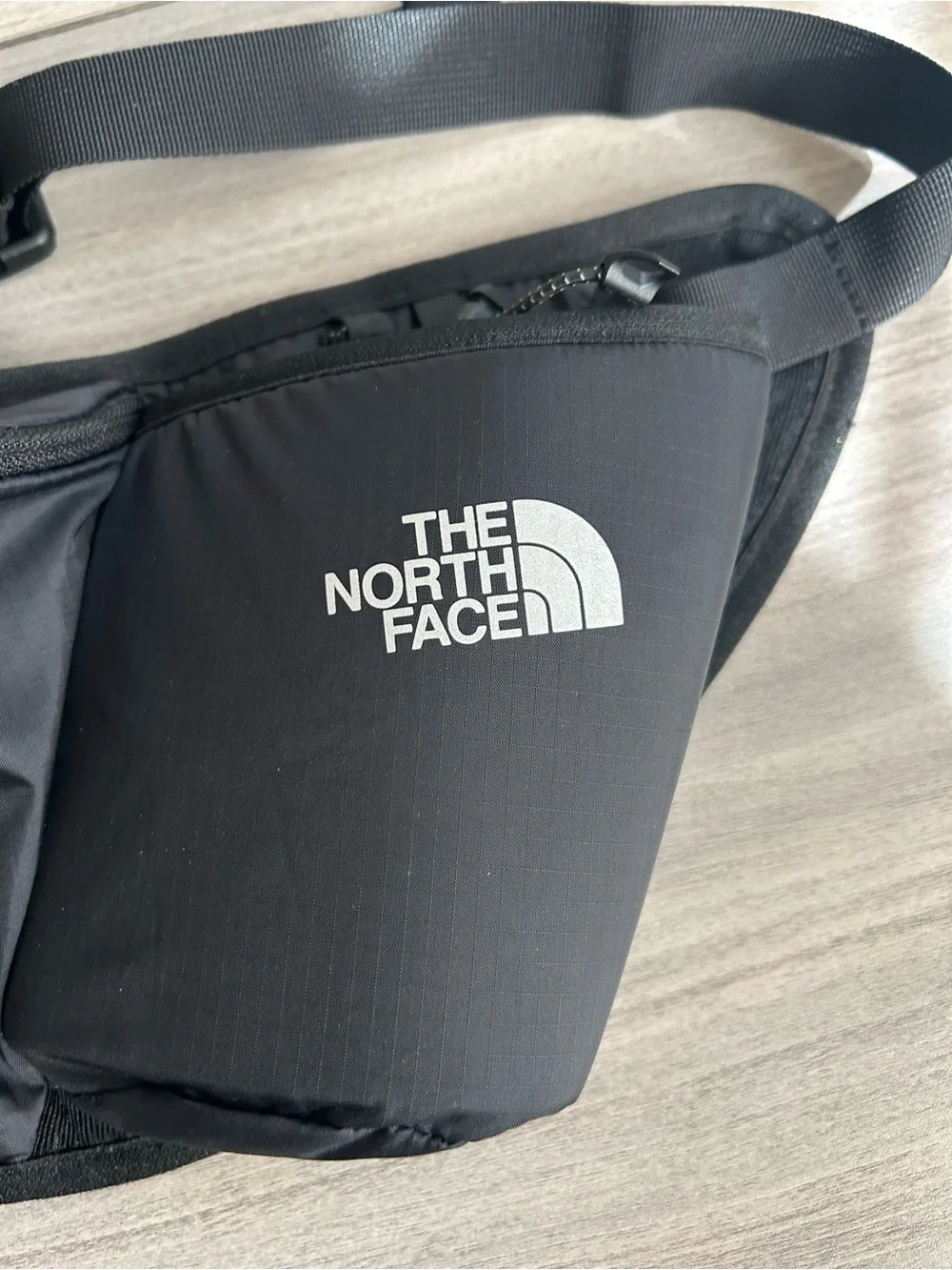 The North Face crossbody logo