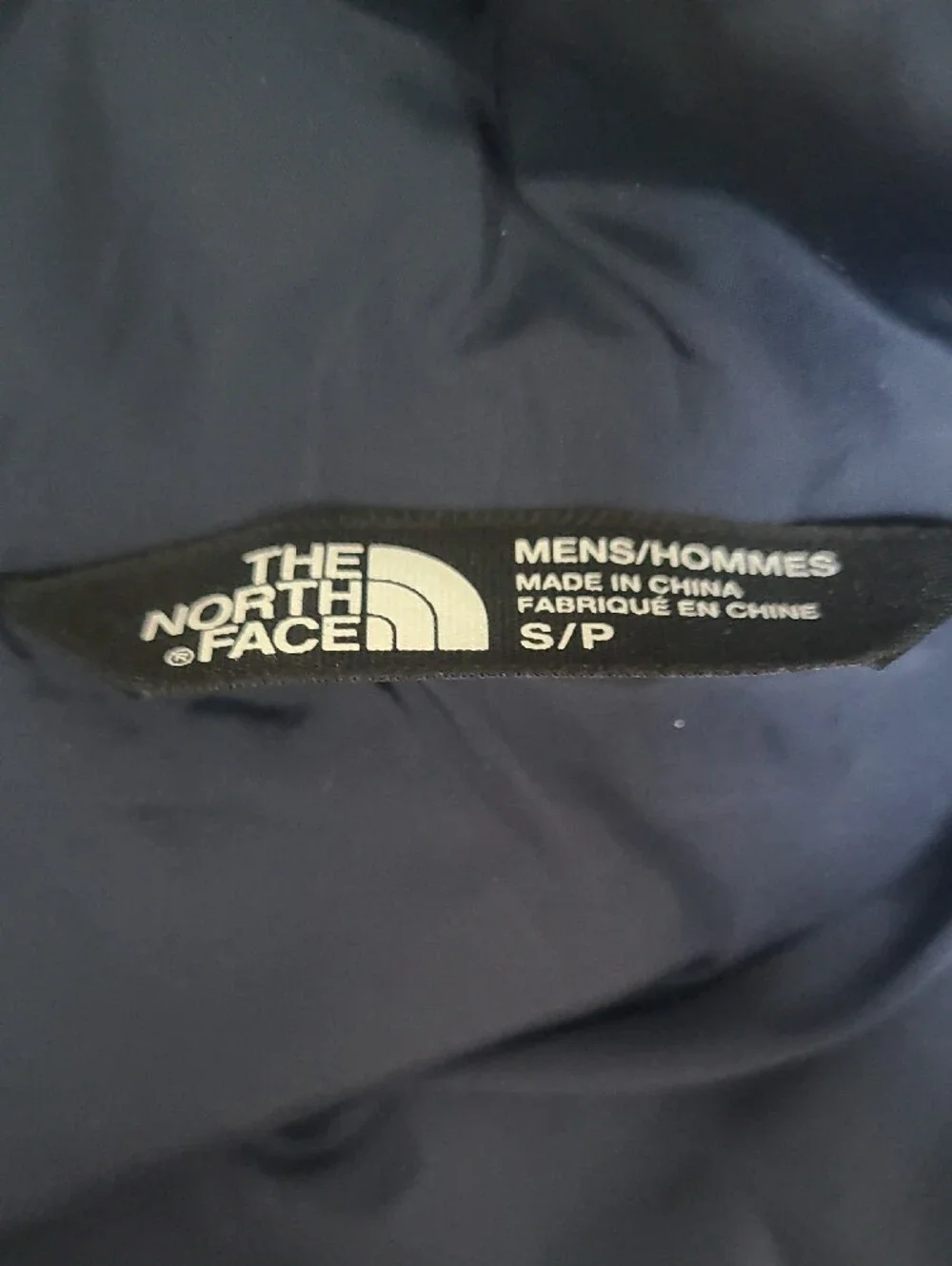 The North Face Navy Blue Jacket with Orange Trim