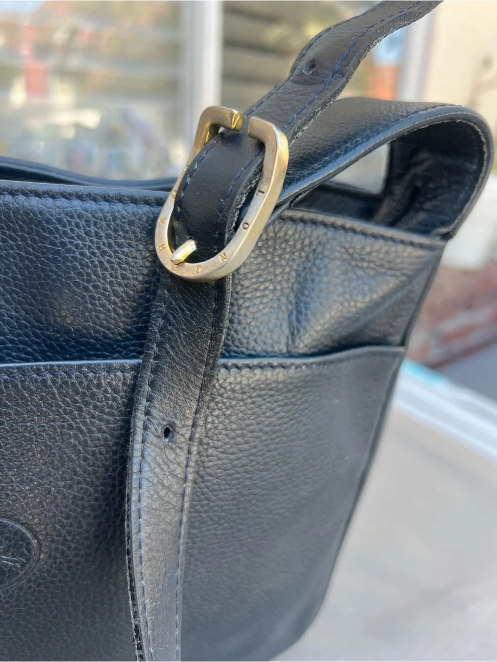 Longchamp compact pebbled